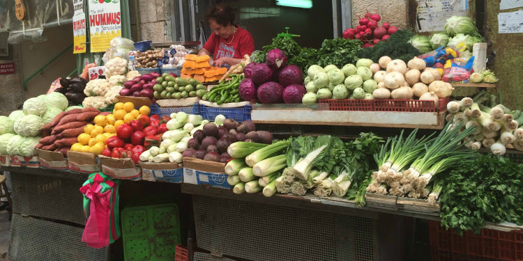 Several fruits and vegetables at a food market in Israel.