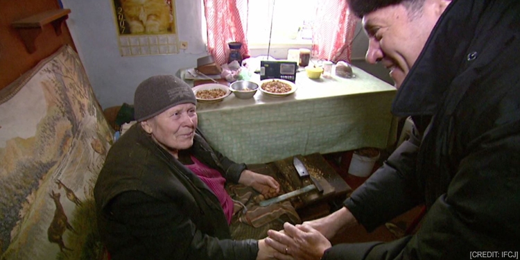 Rabbi Eckstein greeting an elderly Jewish woman.