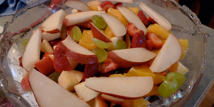 Close up image of fruit salad in a glass bowl