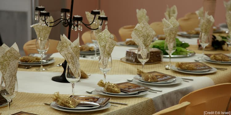 A gold table place setting for Passover.
