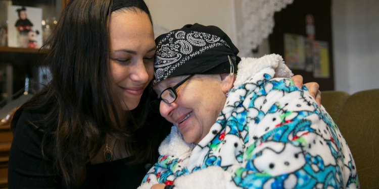 Yael Eckstein hugging Chava, an IFCJ recipient.